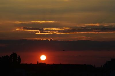 Scenic view of dramatic sky during sunset