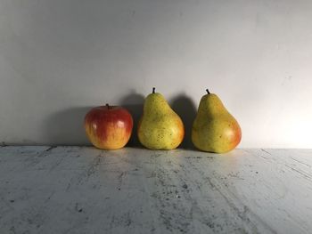 Two pears and an apple 