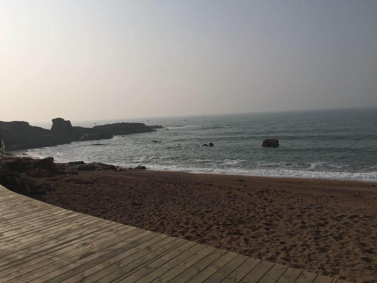 sea, horizon over water, water, clear sky, beach, copy space, tranquil scene, tranquility, shore, scenics, sand, beauty in nature, nature, coastline, idyllic, calm, remote, outdoors, wave, sky