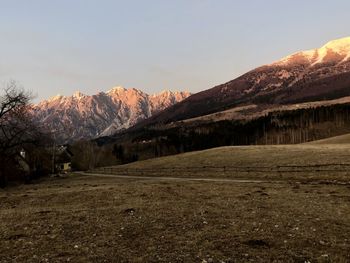 Scenic view of snowcapped mountains against sky