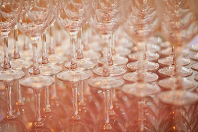 Close-up of wineglasses on table