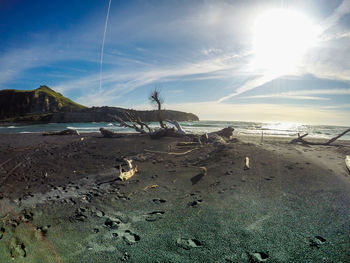 Scenic view of beach against sky