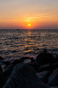 Scenic view of sea against sky during sunset