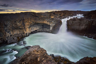 The stunning waterfall with cloudy sunset at aldeyjarfoss, iceland