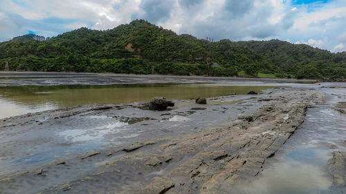 Scenic view of river against sky