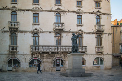 Statue of historic building in city