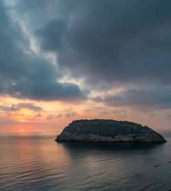 Scenic view of sea against sky at sunset