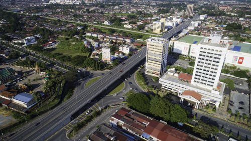 High angle view of street amidst buildings in city