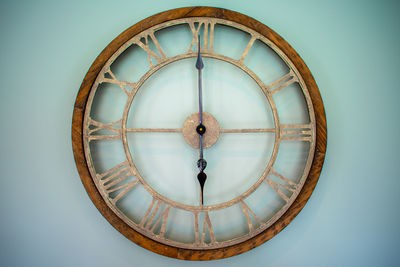 Close-up of clock on wall