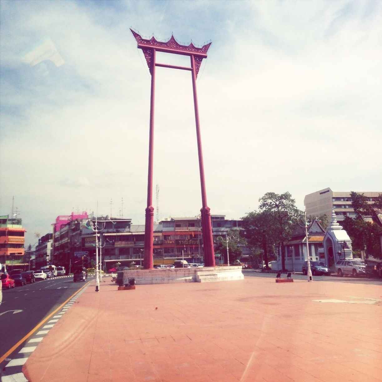 architecture, built structure, building exterior, sky, street light, cloud - sky, cloud, city, day, tree, street, outdoors, empty, sunlight, road, cloudy, incidental people, no people, absence, pole