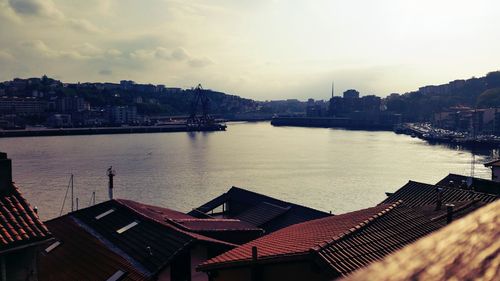 Buildings by river