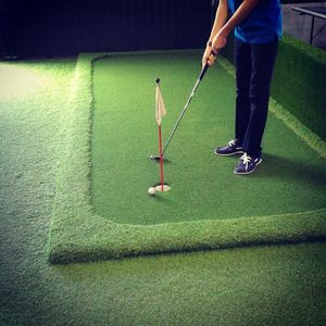 Low section of man standing on skateboard