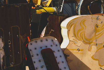 Close-up of rollercoaster on table at amusement park