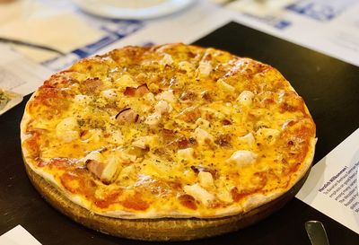 High angle view of pizza in plate on table