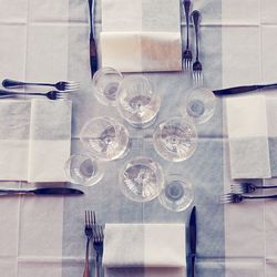 High angle view of glass on table in restaurant