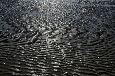 High angle view of raindrops on sea