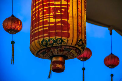 Low angle view of illuminated light bulb