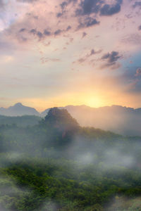 Scenic view of mountains against sky during sunset