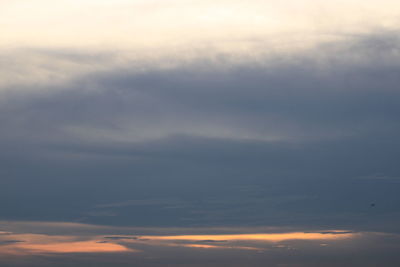 Low angle view of clouds in sky during sunset