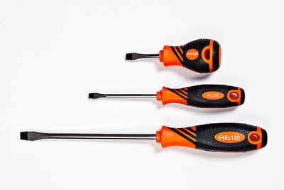 High angle view of screwdrivers against white background