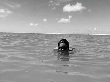 Man swimming in sea