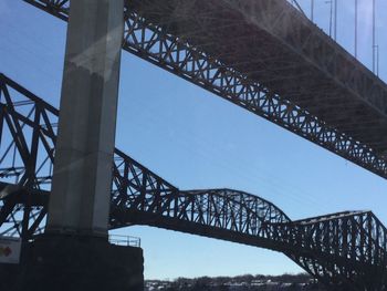 Low angle view of bridge against sky