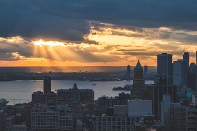 High angle view of buildings against sky during sunset