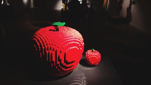 Close-up of illuminated red table