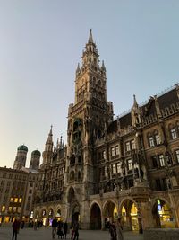 Group of people in front of building