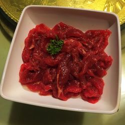 High angle view of strawberries in plate