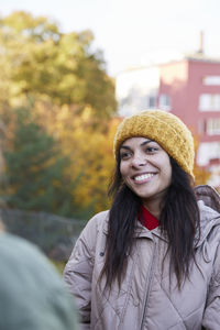 Happy woman in autumn scenery