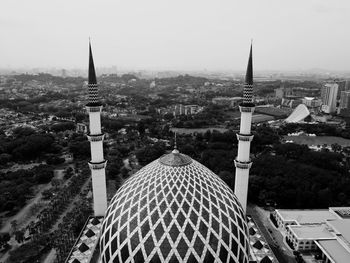 Low angle view of mosque against sky