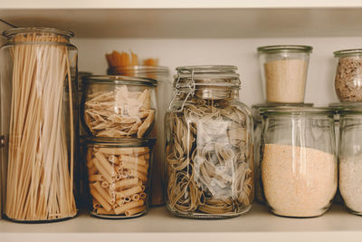 Close-up of glass jar on table