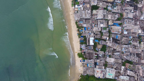 Panoramic view of city by sea