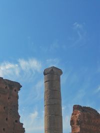 Low angle view of building against blue sky