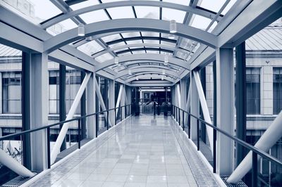 Tiled floor in empty corridor