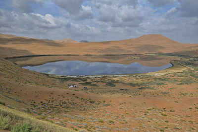 Scenic view of desert against sky