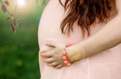 Close-up of woman holding hands