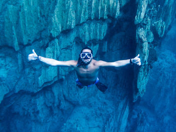 Man swimming in sea