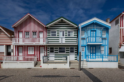 Residential houses against sky in city