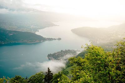 High angle view of trees and mountains against sky