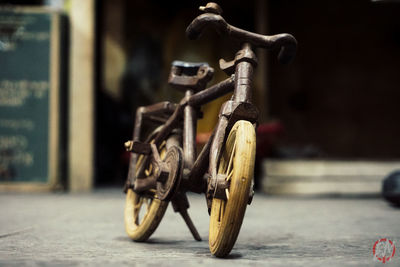 Close-up of motorcycle on road