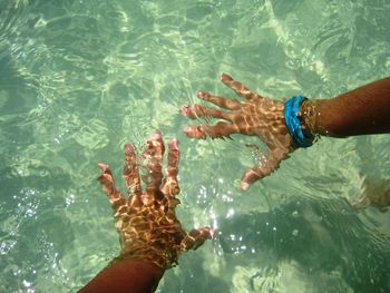Low section of people in swimming pool