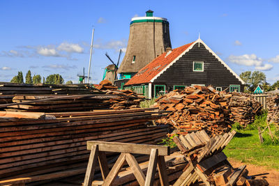  stack of firewood by the windmill