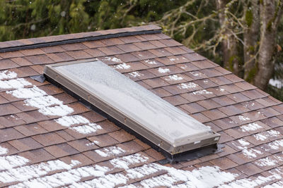 High angle view of damaged roof on field