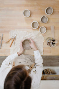 High angle view of people on table