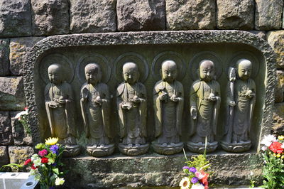 Statue of flowers in the background