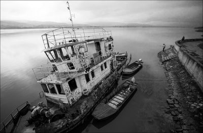 High angle view of abandoned boat moored on sea