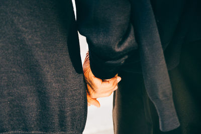 Close-up of hand holding hands