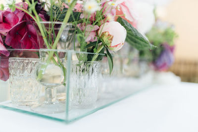 Close-up of flower in glass on table